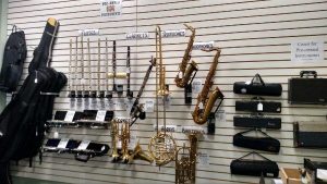 Various brass instruments on wall