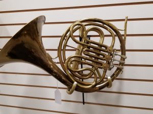 French horn on wall