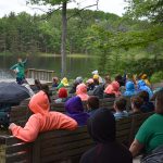 Campers listening to speaker