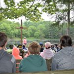 Campers listening to speaker