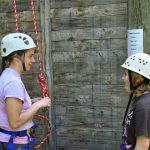 Two people getting ready to rock climb